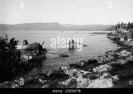 'Middle East History - Choice set of thirteen slides illustrating the Sea of Galilee and its fishermen still ''toiling with their nets.'' Fishing boats at Bethsaida' Stock Photo