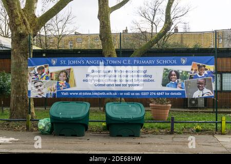 A banner for St John's Angell Town C.E. Primary School in Brixton. Stock Photo