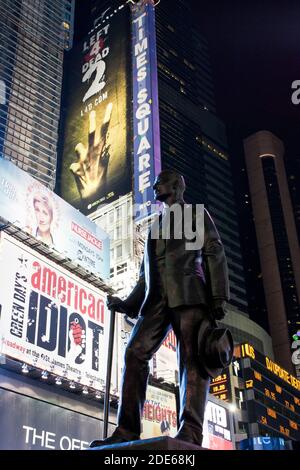 George M Cohan's Give My Regards to Broadway statue with Times Square sign in background, New York, USA Stock Photo