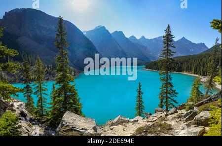 Moraine lake beautiful landscape in summer to early autumn sunny day morning. Sparkle turquoise blue water, snow-covered Valley of the Ten Peaks. Banf
