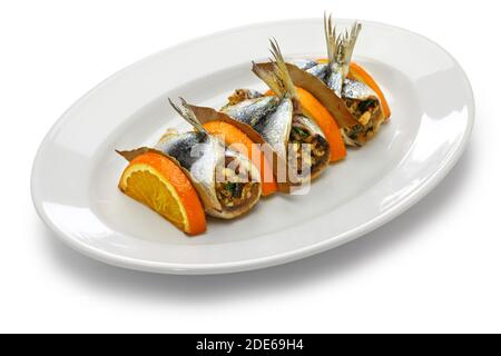 Sarde a Beccafico, traditional Sicilian cuisine, anchovy roolls stuffed bread crumbs, raisins and pine nuts. Stock Photo