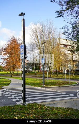 Pedestrian crossing traffic sign equipped with solar-powered warning ...