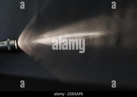 light from torch on black Stock Photo