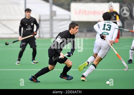 Racing's Jerome Truyens fights for the ball during a hockey game between Royal Racing Club de Bruxelles and Waterloo Ducks HC, Sunday 29 November 2020 Stock Photo