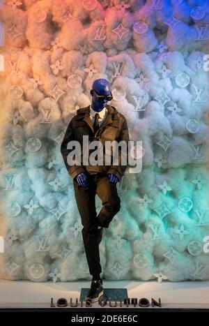 Florence, Italy - 2020, November 19: Louis Vuitton luxury menswear, in a fashion boutique window. Stock Photo