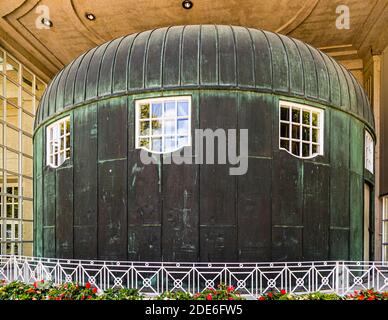 Rotating orchestra shell seen from the spa gardens of Bad Kissingen, Germany Stock Photo