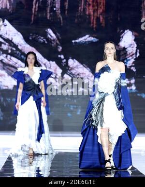 Qingdao, China's Shandong Province. 29th Nov, 2020. Models present creations of Chinese designer Zhang Zhaoda in Qingdao, east China's Shandong Province, Nov. 29, 2020. Credit: Chen Jianli/Xinhua/Alamy Live News