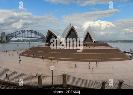 Sydney, Australia - Early morning at the Sydney Opera House. The Harbour Bridge can be seen in the background. Stock Photo