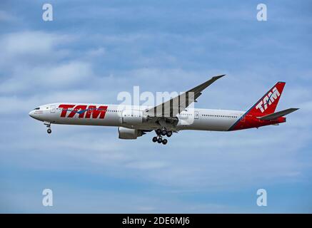 A Boeing 777-32W(ER) of Latam Airlines coming in to London's Heathrow Airport. Stock Photo