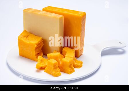 Cheese collection, orange and yellow smoked British cheese from England close up Stock Photo