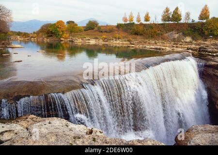 Autumn mountain landscape with river and waterfall.  Montenegro, Podgorica. Cijevna river waterfall Stock Photo