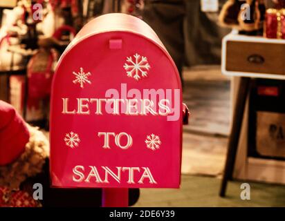 Letters to Santa, a red vintage mailbox in  Santa Claus workroom Stock Photo