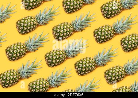 Pineapple pattern on yellow background Stock Photo