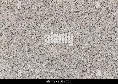 Fine pebbles wall background Stock Photo
