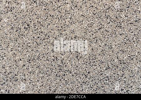 Fine pebbles wall background Stock Photo