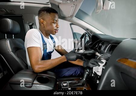 Portrait of worker use car interior steam cleaner. Vapor sterilization  Stock Photo - Alamy