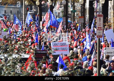 Washington DC. Nov 14, 2020. Million Maga March. Large group of peaceful Trump’s supporters with placards, signs and flags gathered at Freedom Plaza. Stock Photo