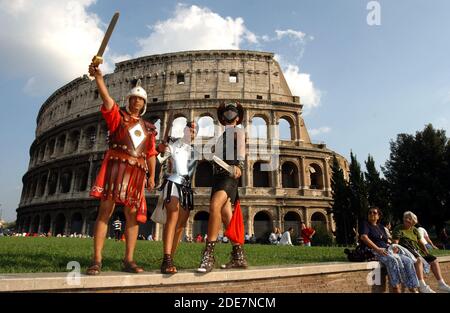 Actors pose for tourists as gladiators and roman centurions at Rome's Colosseum, Italy (9-2002). The Colosseum (or Coliseum) also known as the Flavian Amphitheatre in Rome, Italy on april 2017. Construction began under the emperor Vespasian in AD 72 and was completed in AD 80 under his successor and heir Titus.Photo: Eric Vandeville/ABACAPRESS.COM Stock Photo