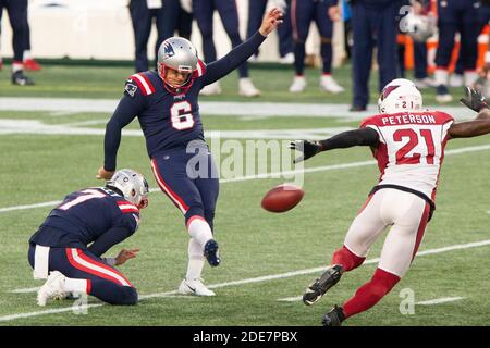 Foxborough, United States. 29th Nov, 2020. New England Patriots kicker Nick Folk (6) connects for a 50-yard game winning field goal held by Jake Bailey (7) while under pressure by Arizona Cardinals cornerback Patrick Peterson (21) in the fourth quarter at Gillette Stadium in Foxborough, Massachusetts on Sunday, November 29, 2020. The Patriots defeated the Cardinals 20-17. Photo by Matthew Healey/UPI Credit: UPI/Alamy Live News Stock Photo