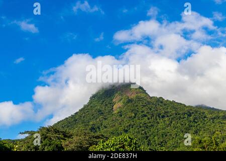Abraão mountain Pico do Papagaio with clouds. Ilha Grande, Angra dos Reis, Rio de Janeiro, Brazil. Stock Photo