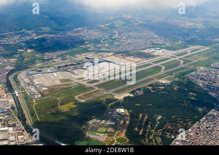 Sao Paulo Guarulhos International Airport aerial view in Guarulhos, Sao Paulo, Brazil. Overview of Cumbica airport, know as GRU Airport. Stock Photo