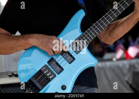 Close up of the hands of a musician playing an electric guitar Stock Photo