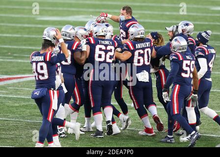 Gillette Stadium. 29th Nov, 2020. MA, USA; New England Patriots players swarm New England Patriots kicker Nick Folk (6) after kicking the game winning field goal during the NFL game between Arizona Cardinals and New England Patriots at Gillette Stadium. Anthony Nesmith/CSM/Alamy Live News Stock Photo