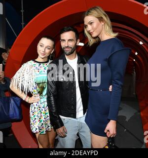 Emma Chamberlain, Stylist Nicolas Ghesquiere and Karlie Kloss pose after  the Louis Vuitton show as part of the Paris Fashion Week Womenswear  Fall/Winter 2019/2020 on March 05, 2019 in Paris, France. Photo