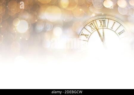 New Year's at midnight concept. Clock of holiday counting last moments before Christmas or New Year. Stock Photo