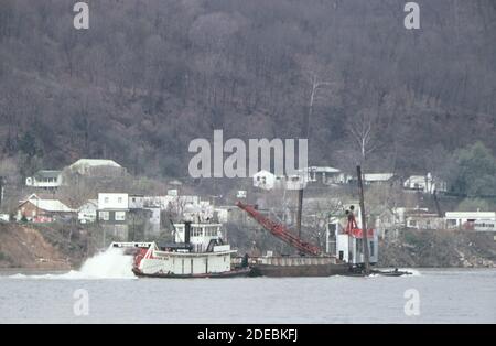 1970s Photo (1973) -  Boat passes barge on the Kanawha River Stock Photo