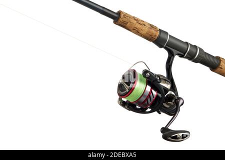 Fishing tackle isolated on white. Spinning reel close up. Stock Photo