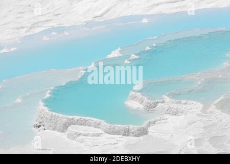 Pamukkale travertine pools and terraces view from Denizli, Turkey. Cotton Castle. Travel and Holiday background. Stock Photo