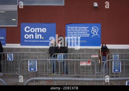 People line up outside to buy the newly-launched iPhone Duo at the ...