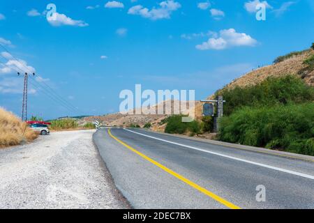 Summer day landscape with a winding road, The road to the Sea of Galilee, Israel, High quality photo Stock Photo