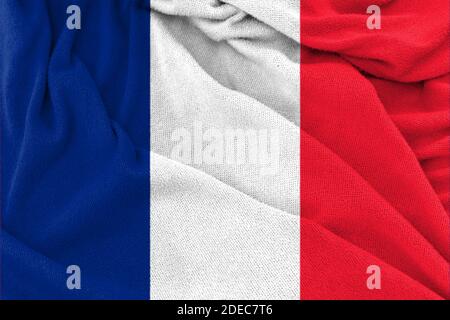 Fabric wavy texture national flag of France. Stock Photo