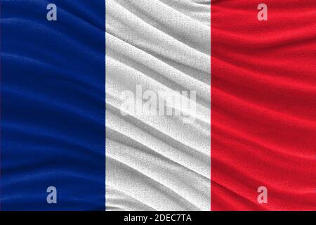 Fabric wavy texture national flag of France. Stock Photo