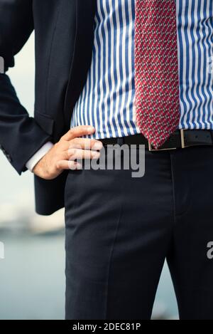 Close up of a business man hand on hip Stock Photo