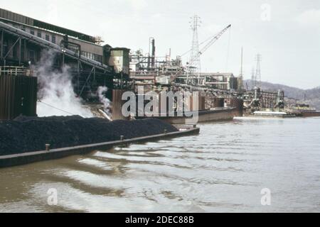 1970s Photo (1973) -  Hot water flows into the Kanawha River from the FMC corporation's South Charleston West Virginia plant. It is distilled water that was used for cooling. Stock Photo