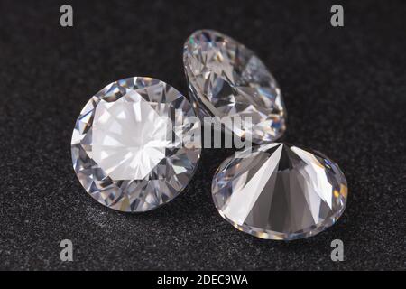 Three precious stones on a dark background, close-up Stock Photo