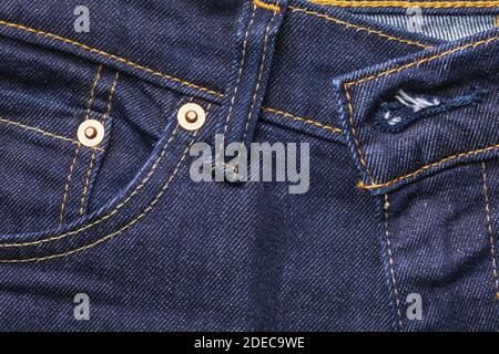 Dark blue jeans texture for use as a background. Stock Photo