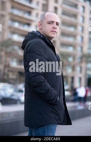 Pensive 45 years old man looking away outdoors Stock Photo