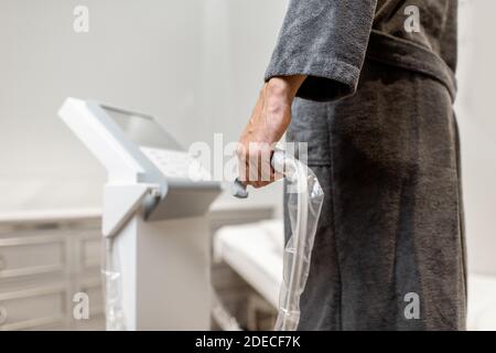 Man measuring body composition balance, holding handles of a medical scales  during Inbody test Stock Photo - Alamy