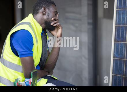 Engineer or architect holding hands at his head. He is having problems in work. Engineering concept. Stock Photo