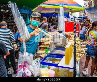 Sugar cane juice for sale in the Sampeng Market area in Bangkok Thailand Southeast Asia Stock Photo