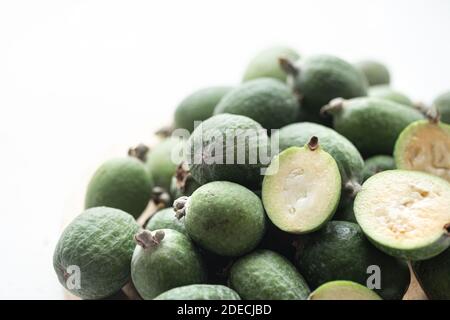 Feijoa green on a light background. Feijoa Selloana is a fruit crop from tropical regions. Organic healthy food concept, eco friendly natural products Stock Photo
