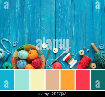 Color matching palette from image of wool, yarn balls, knitting needles on turquoise wooden boards Stock Photo