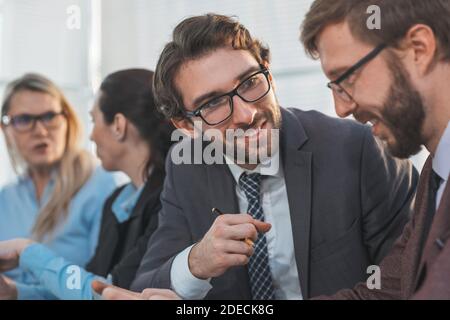 employees discussing something during an office meeting Stock Photo