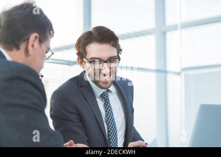 close up . young employee analyzing new information Stock Photo