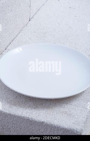 empty plate and fork. On a white background. Stock Photo