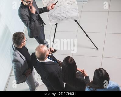 business team is working on a new project in a modern office. Stock Photo